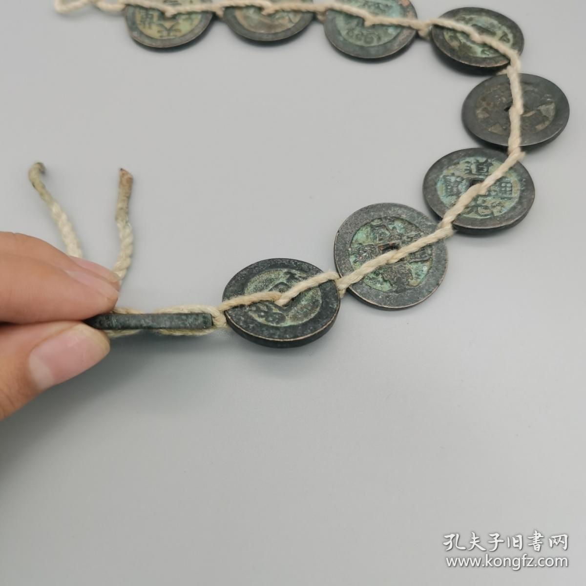 铜钱一串15个，揭秘生肖之谜与落实精神的实践